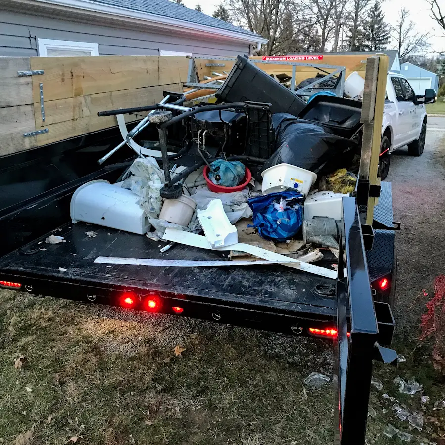 Roll-off dumpster delivered to a residential driveway in Los Banos